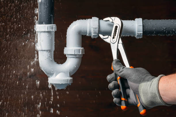 Professional Emergency Plumber technician working in Grasston, MN